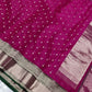 Rani pink Chanderi saree showing silver butta detail