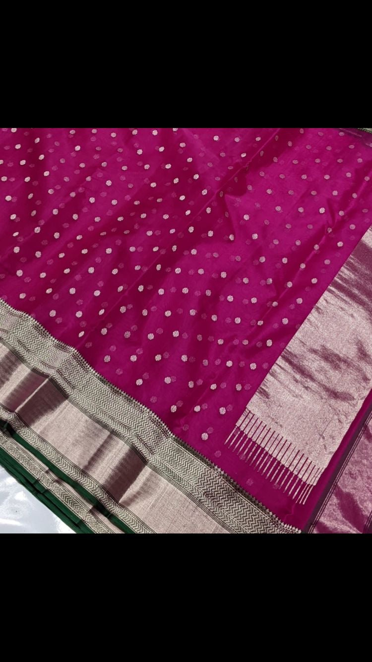 Rani pink Chanderi saree showing silver butta detail