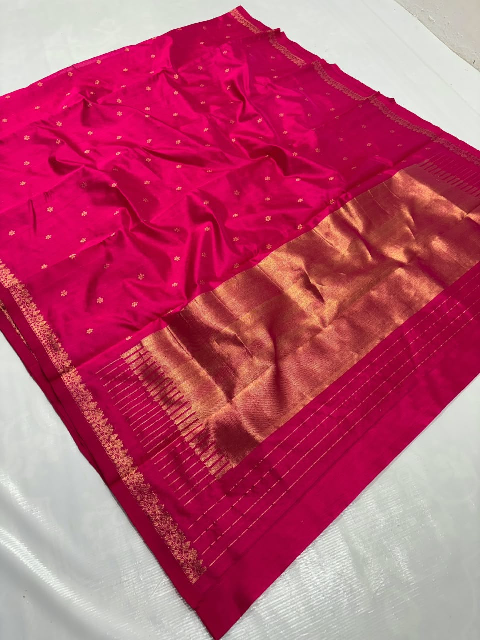 Rani-pink Katan Silk Chanderi with gold-toned woven motifs