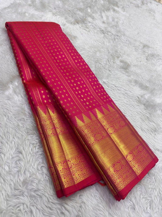 Kanchipattu silk saree in rani pink with antique gold border Kamalam Butta weave traditional zari detail