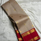 Close view of the lower rani pink border with ornamental gold zari bands