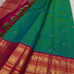 Kanchipattu silk saree in peacock teal with rani pink border Korvai Varisaipet weave traditional zari detail