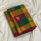 Laid-out multicolour Paalum Pazhamum Kanchipuram saree showing vibrant checks and a rich pink pallu.