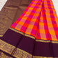 Orange and Rani pink Paalum Pazhamum Pure Silk Kanchipuram saree with traditional checks.