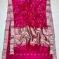 Rani Pink Pattu Silk Chanderi saree displayed in full length showing the saturated pink body and metallic detailing.