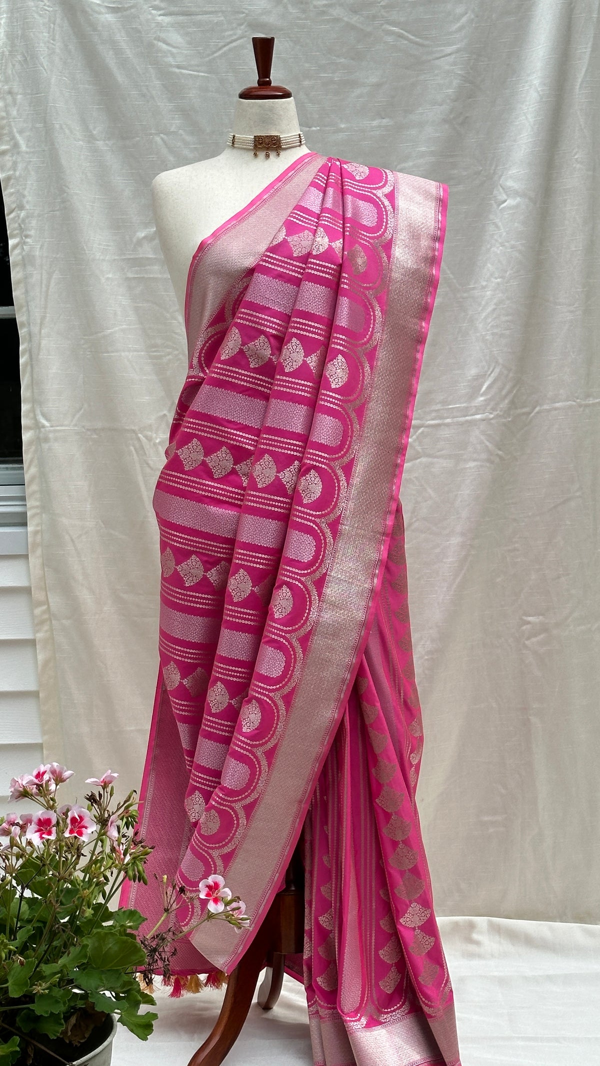 Sona Rupa gold and silver zari pallu on Rani Pink Banarasi saree
