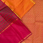 Folded Chilli Red Pure Silk Kanchipuram Rettapet saree with Burnt Orange Ganga Jamuna border and gold zari edging.