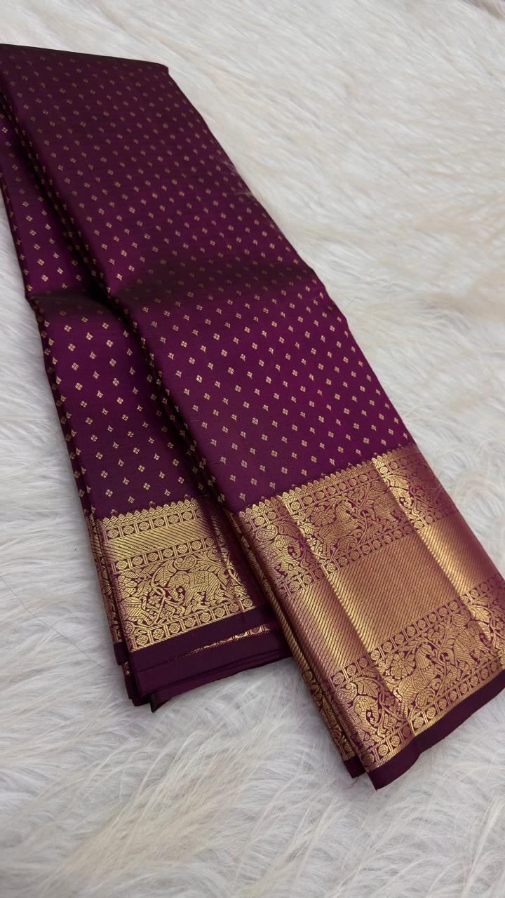 Rani pink Kanchipuram saree with gold buttas