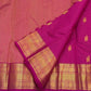 Rani pink Pure Silk Kanchipuram saree draped, showing the fine Zari Kattam grid