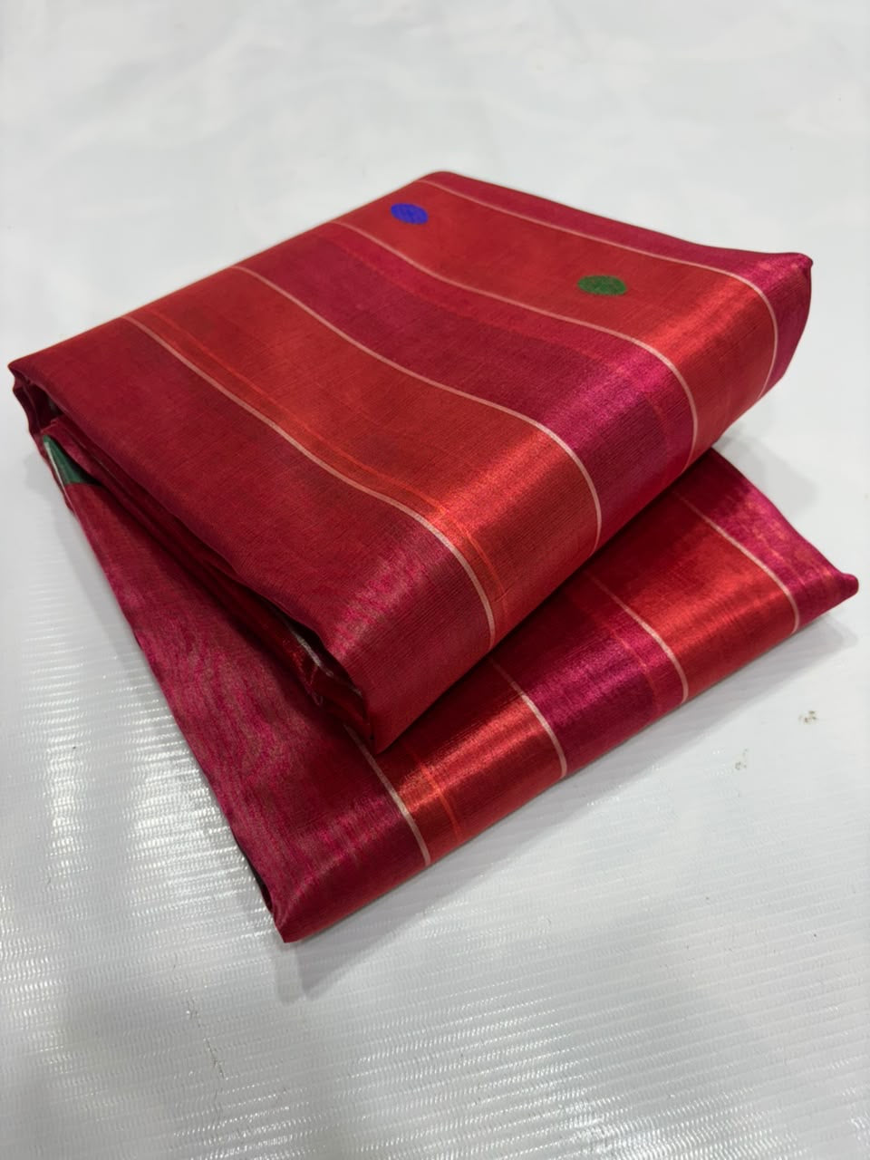 Rani Pink and Vermilion Red Chanderi saree with fine metallic jari stripes across the body