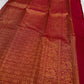 Gold zari border on temple vermillion red Kanjivaram saree