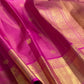 Full Rani Pink Zari Kattam saree showing gold buttas, broad zari border and rich pallu.