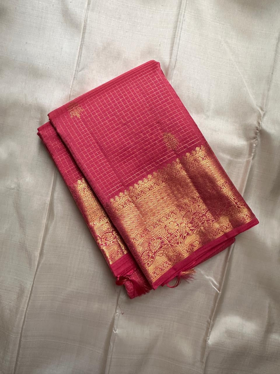 Rani Pink pure silk Kanchi Pattu Zari Kattam saree with fine antique-gold checked weaving and zari buttas.