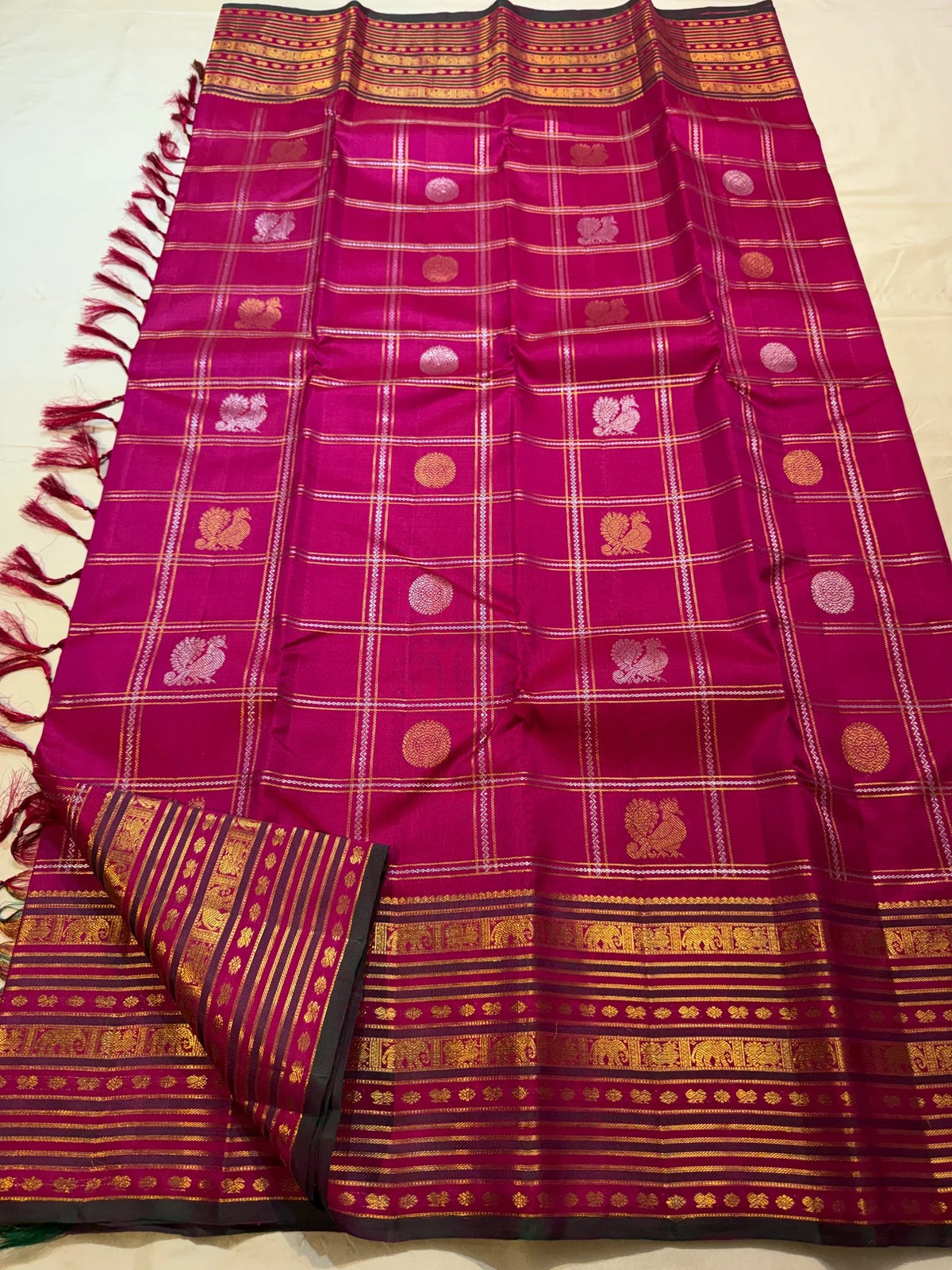 Rani Pink zari motif Kanchipuram saree close-up