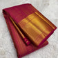 Raspberry pink handwoven pure silk Kanjeevaram saree with rows of petite gold zari buttas