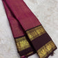Raspberry Magenta pure silk Kanjivaram Zari Kattam saree with Deep Kanchana Brown and antique-gold Mayil border.