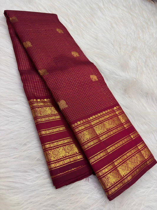 Close view of fine antique-gold checked weaving across Deep Raspberry Maroon Kanjivaram silk.