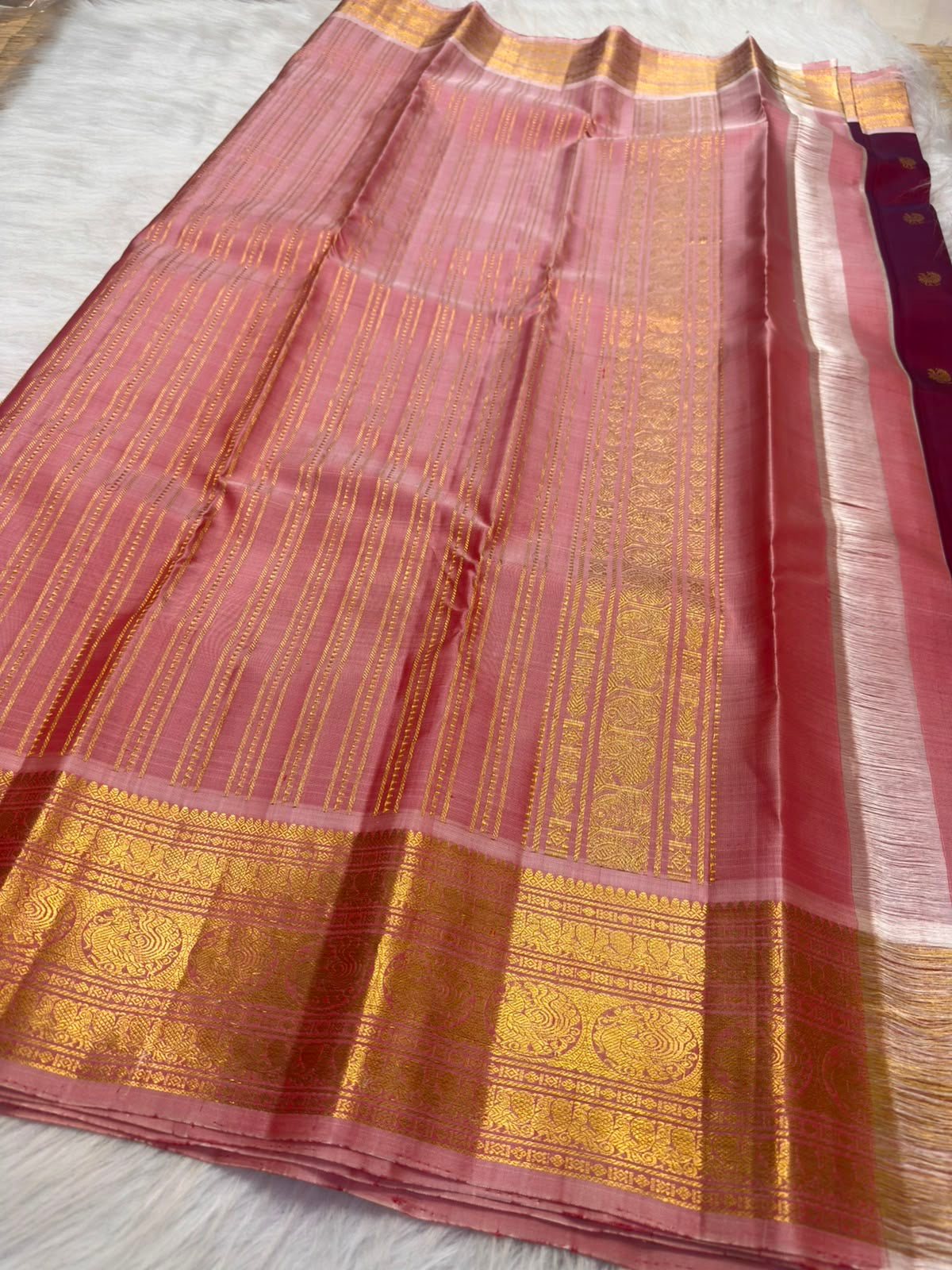 Deep raspberry maroon KanchiPattu saree, Chakram zari butta close-up