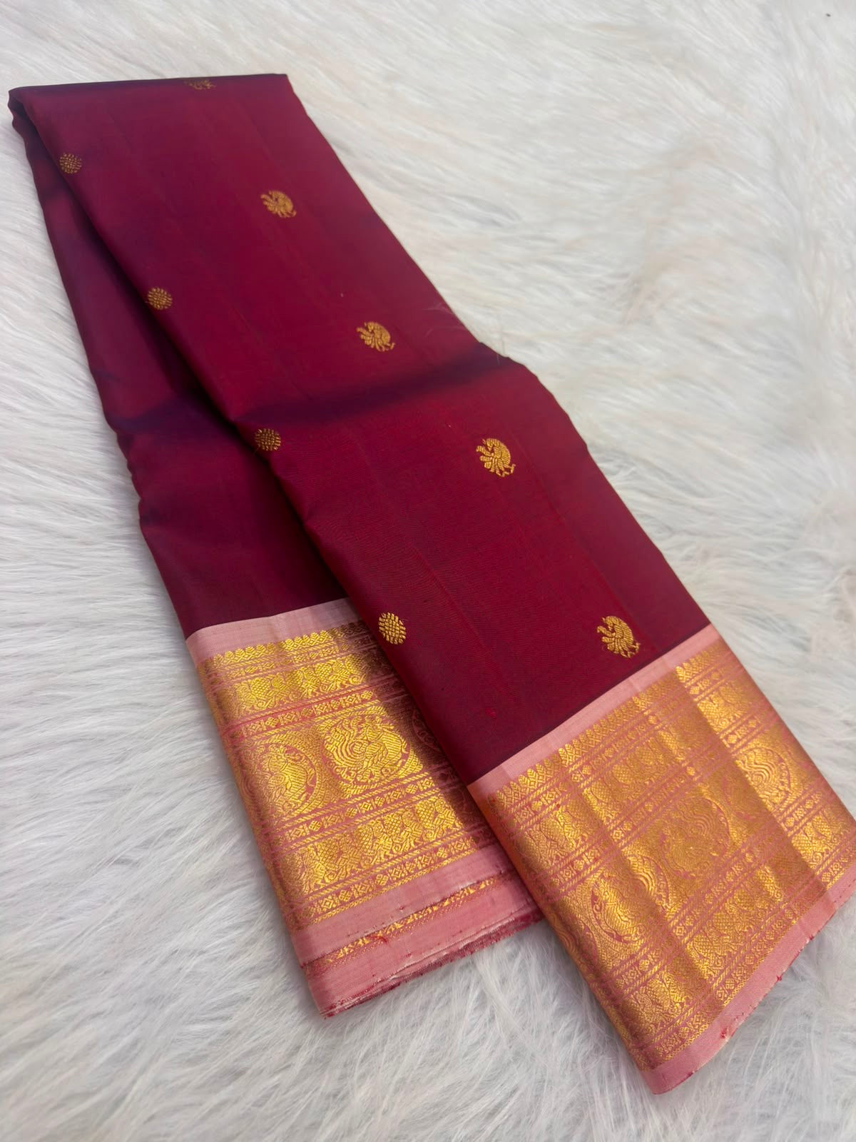 Deep raspberry maroon KanchiPattu Butta saree, close drape view