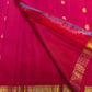 Raspberry Pink pure silk Kanjivaram Butta saree with antique-gold zari motifs.