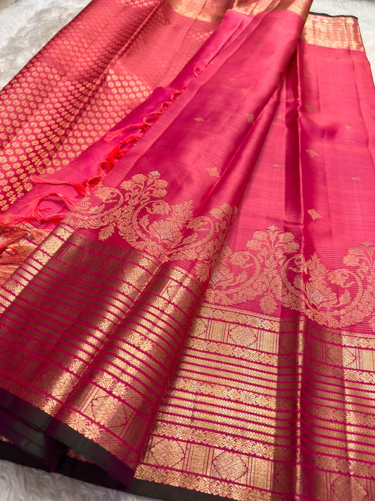 Handwoven pink Kanjivaram Vairaoosi saree with intricate stacked gold zari border