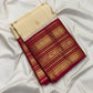 Bougainvillea pink contrast border with stacked antique gold zari bands on Korvai Kanchipuram saree