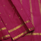 Raspberry pink Kancheepuram pure silk saree with rettapet border – close-up view