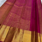 Raspberry pink Kanjeevaram saree with grand antique-gold zari border, close view