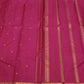 Raspberry pink Kanchipattu silk saree with traditional zari weaving detail