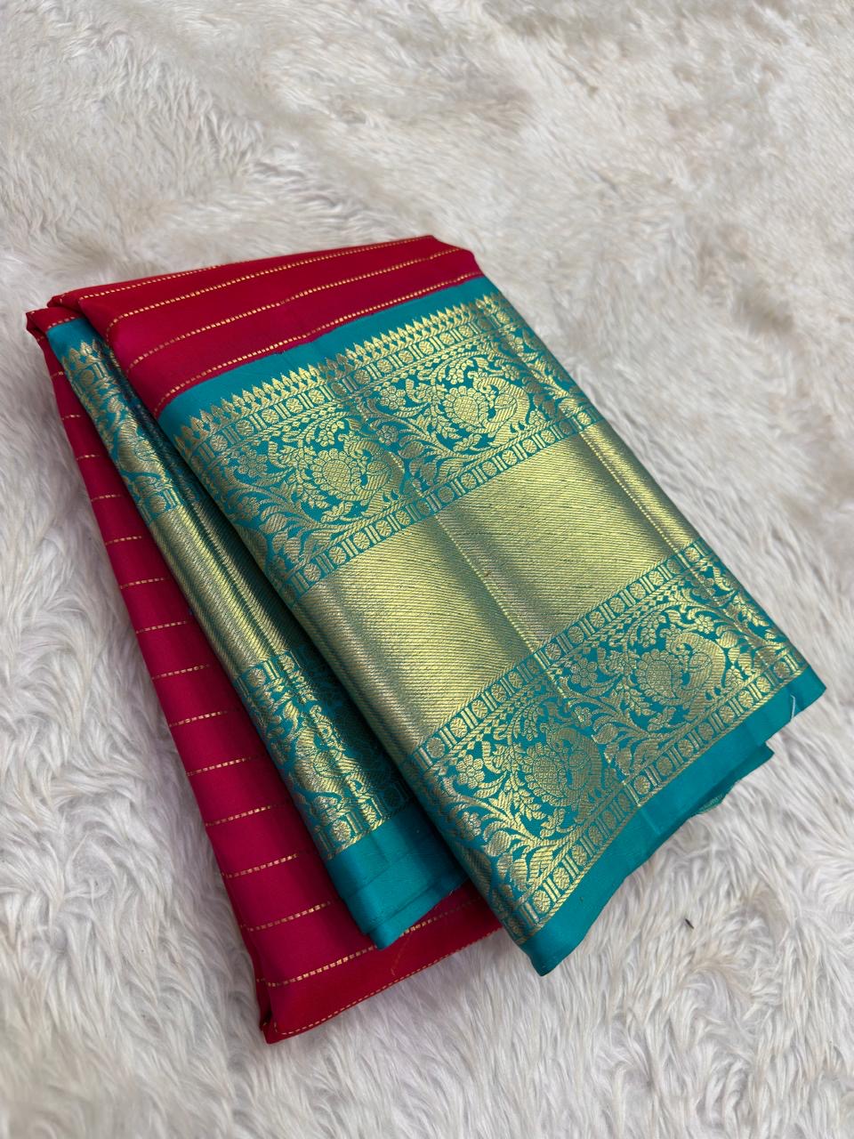 Raspberry Pink pure silk Kanjeevaram saree, Korvai weave with Peacock Teal Zari border — pallu detail