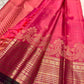 Double-tone pink Vairaoosi saree with warm orange radiance in the silk