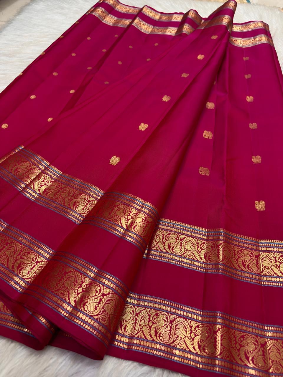 Pomegranate Pink Kanjivaram silk saree with fine Cobalt Blue zari border edging