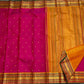 Handwoven pink Kanjivaram saree with delicate antique gold zari buttas