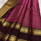 Deep Kanchana Brown Kanchipuram border with handwoven antique-gold Mayil motifs.