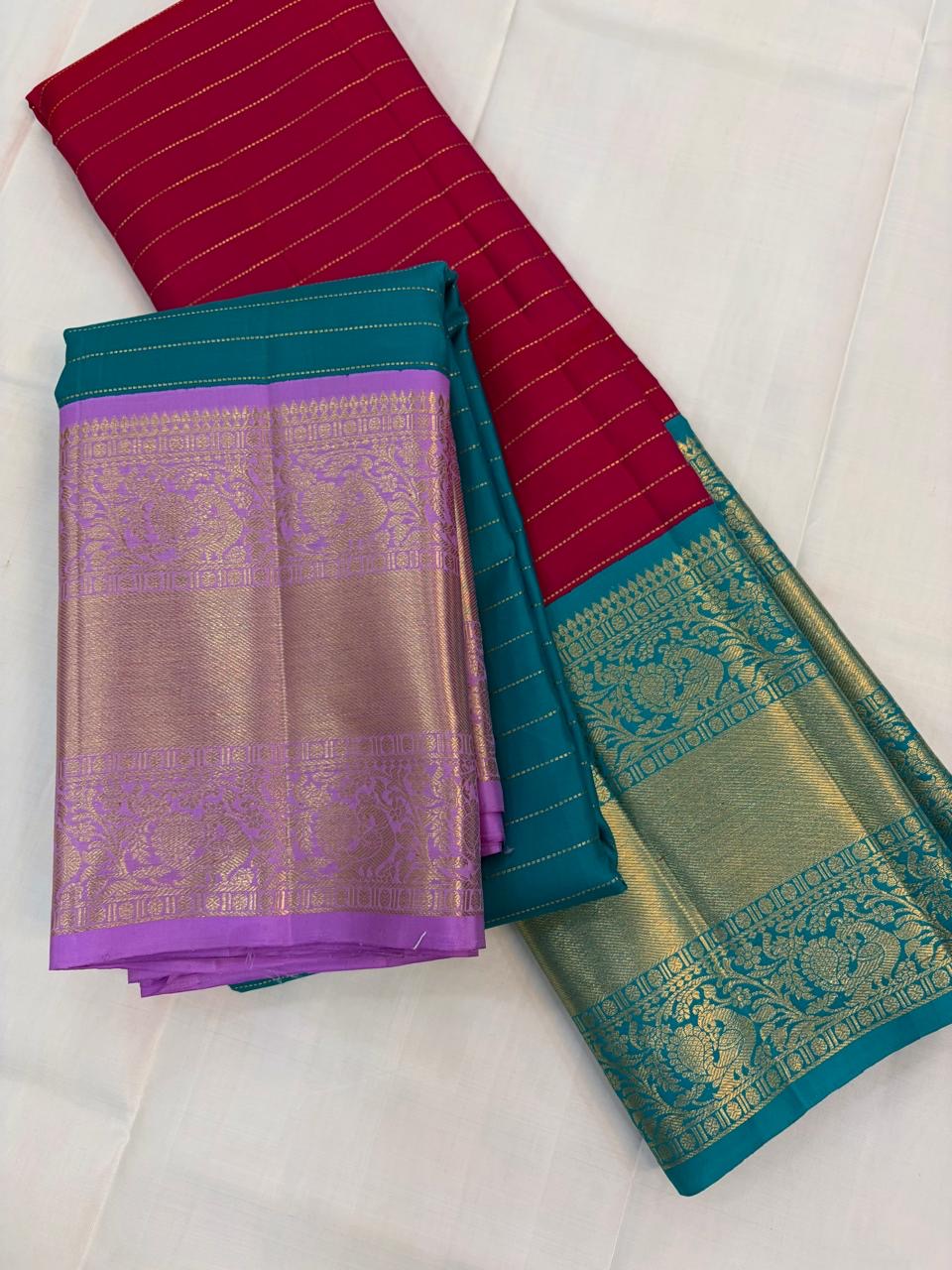 Raspberry Pink pure silk Kanjeevaram saree, Korvai weave with Peacock Teal Zari border — body weave close-up