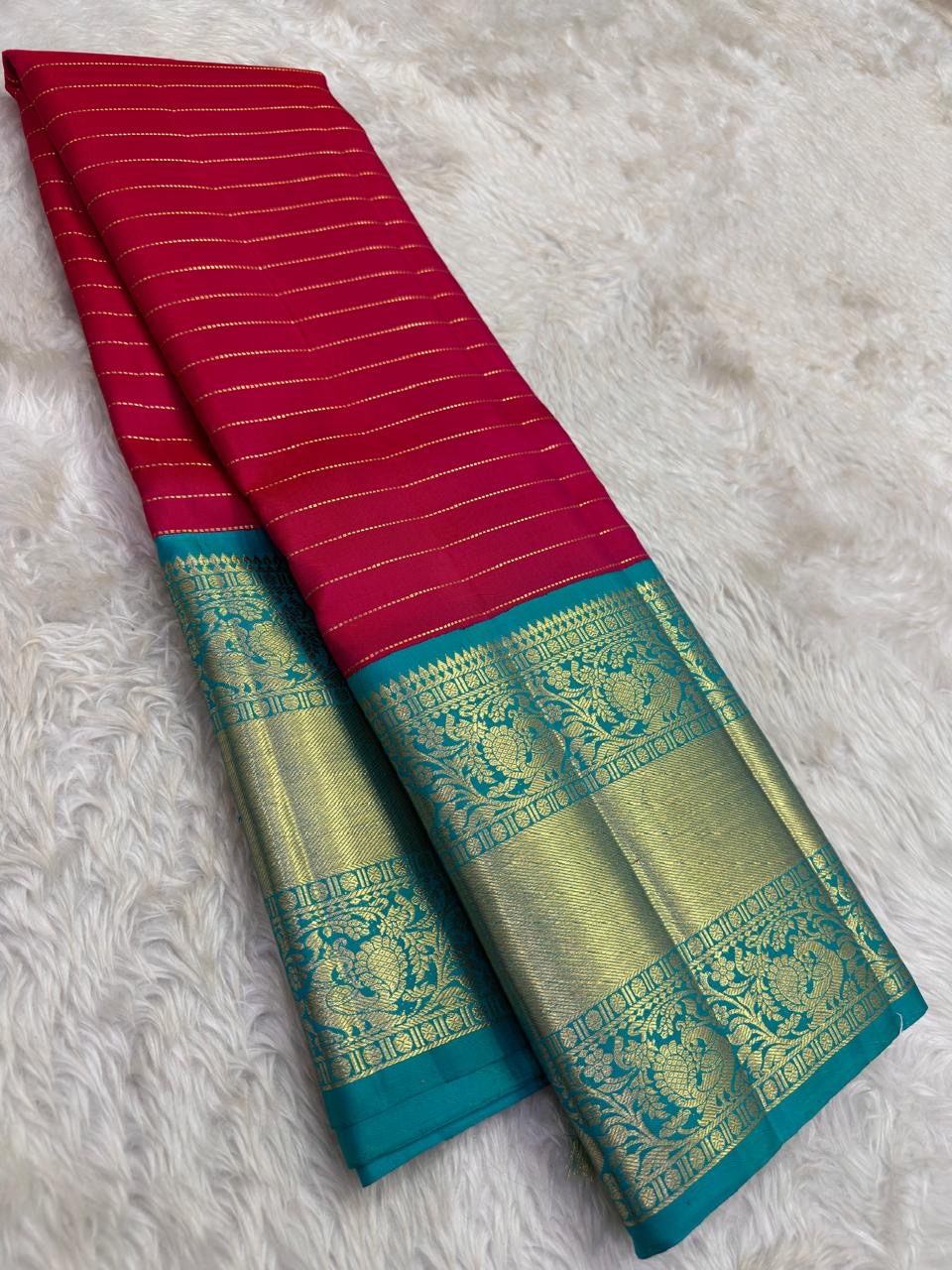 Raspberry Pink pure silk Kanjeevaram saree, Korvai weave with Peacock Teal Zari border — full drape view