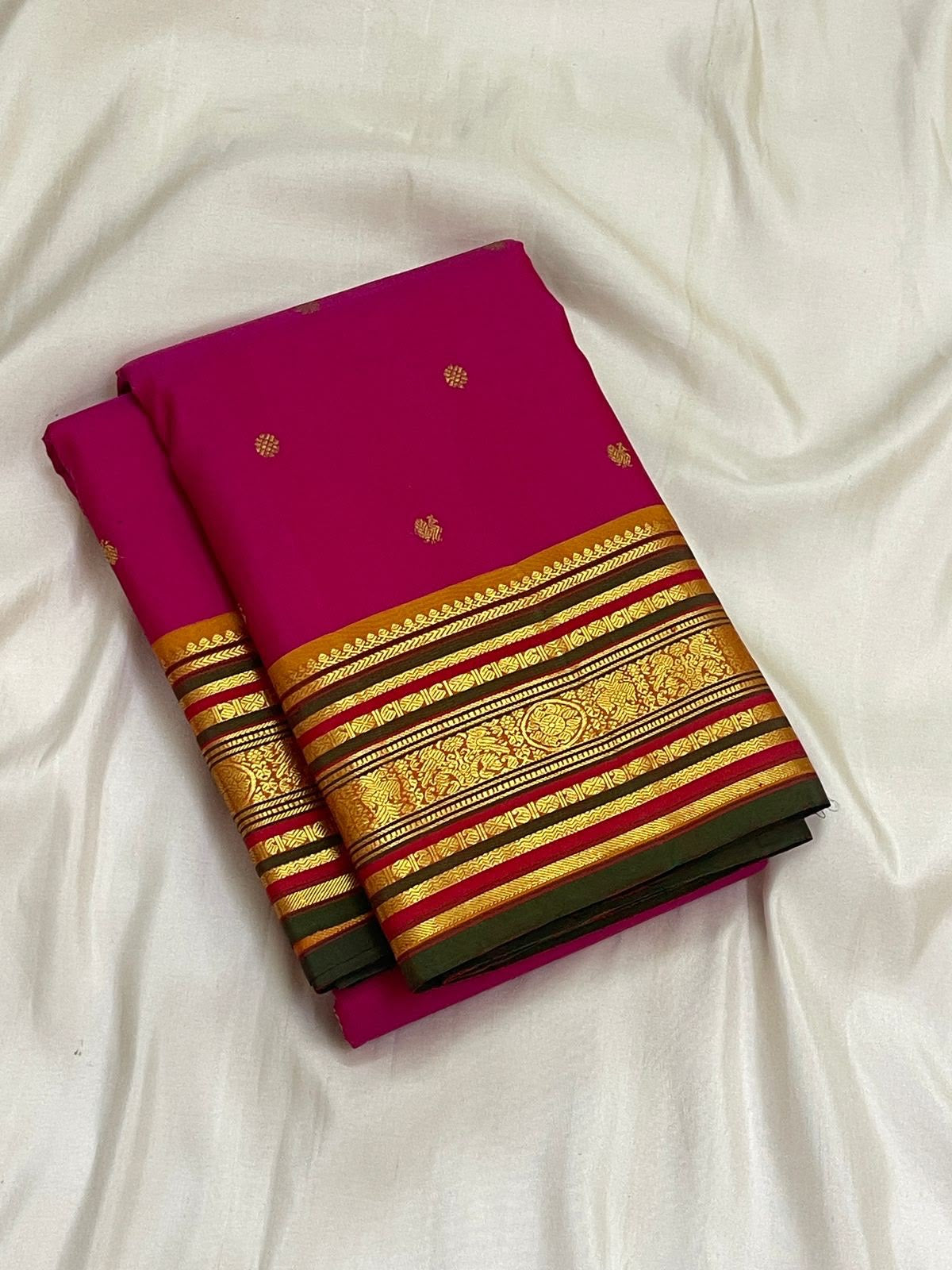 Raspberry Pink Pure Silk Kanchipuram Varisaipet saree with petite gold zari buttas