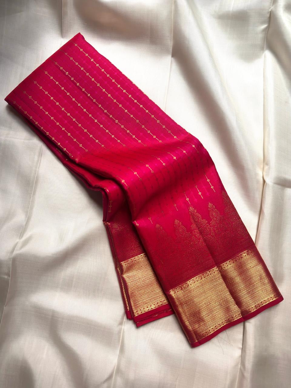 Raspberry Pink Pure Silk Kanjivaram Butta saree with antique gold zari border