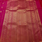 Raspberry Pink Kanchipuram silk saree with individually spaced gold zari buttas.