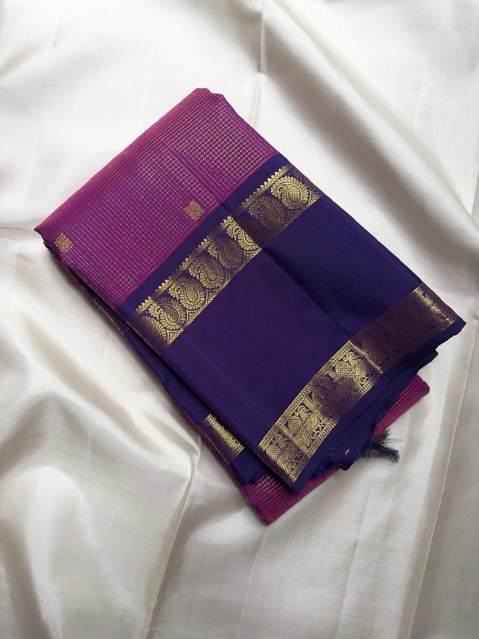Raspberry pink Kanjivaram saree pallu with matching antique-gold zari detailing