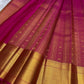Pallu detail of raspberry pink Kanjeevaram saree with antique-gold zari chevron border