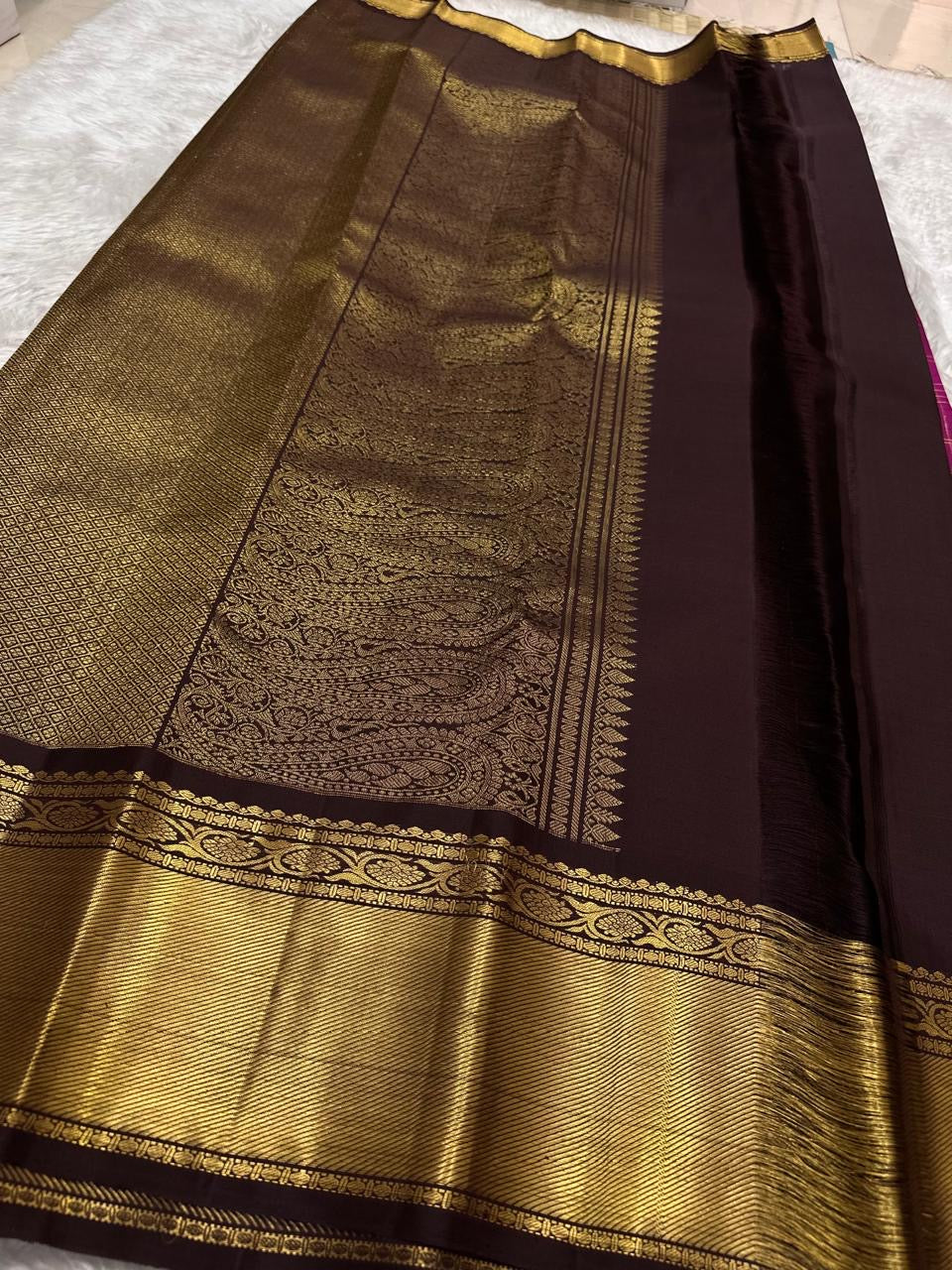 Raspberry purple KanchiPattu saree — deep aubergine border close-up