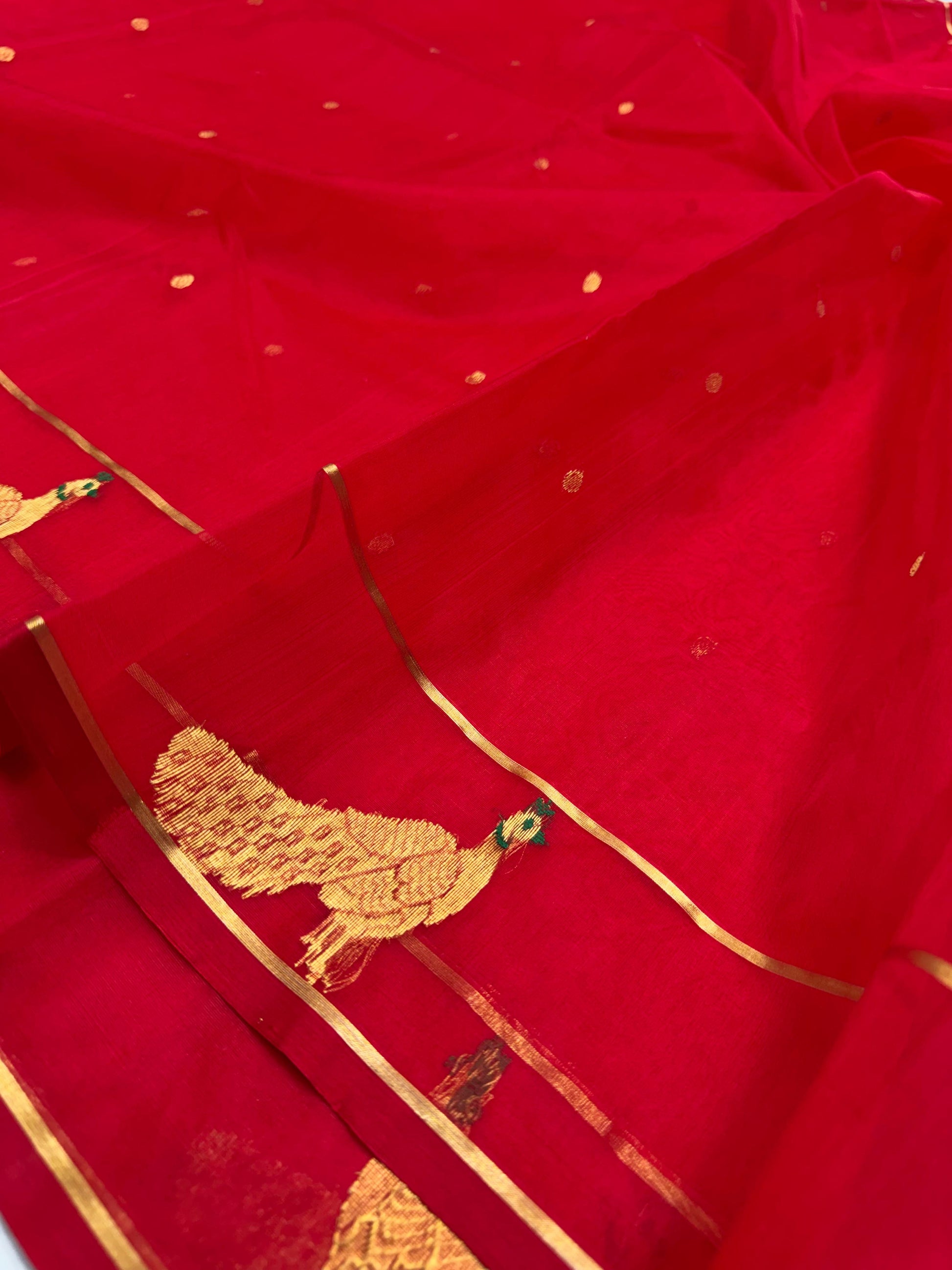 Full raspberry red Chanderi Katan Silk saree with gold buttas, peacock border and luminous pallu