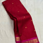 Raspberry red handwoven pure silk Kanchipuram butta saree with peacock teal zari border, full view
