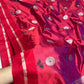 Raspberry Red handloom Chanderi saree draped, showing silver floral buttas across the Pattu Silk body