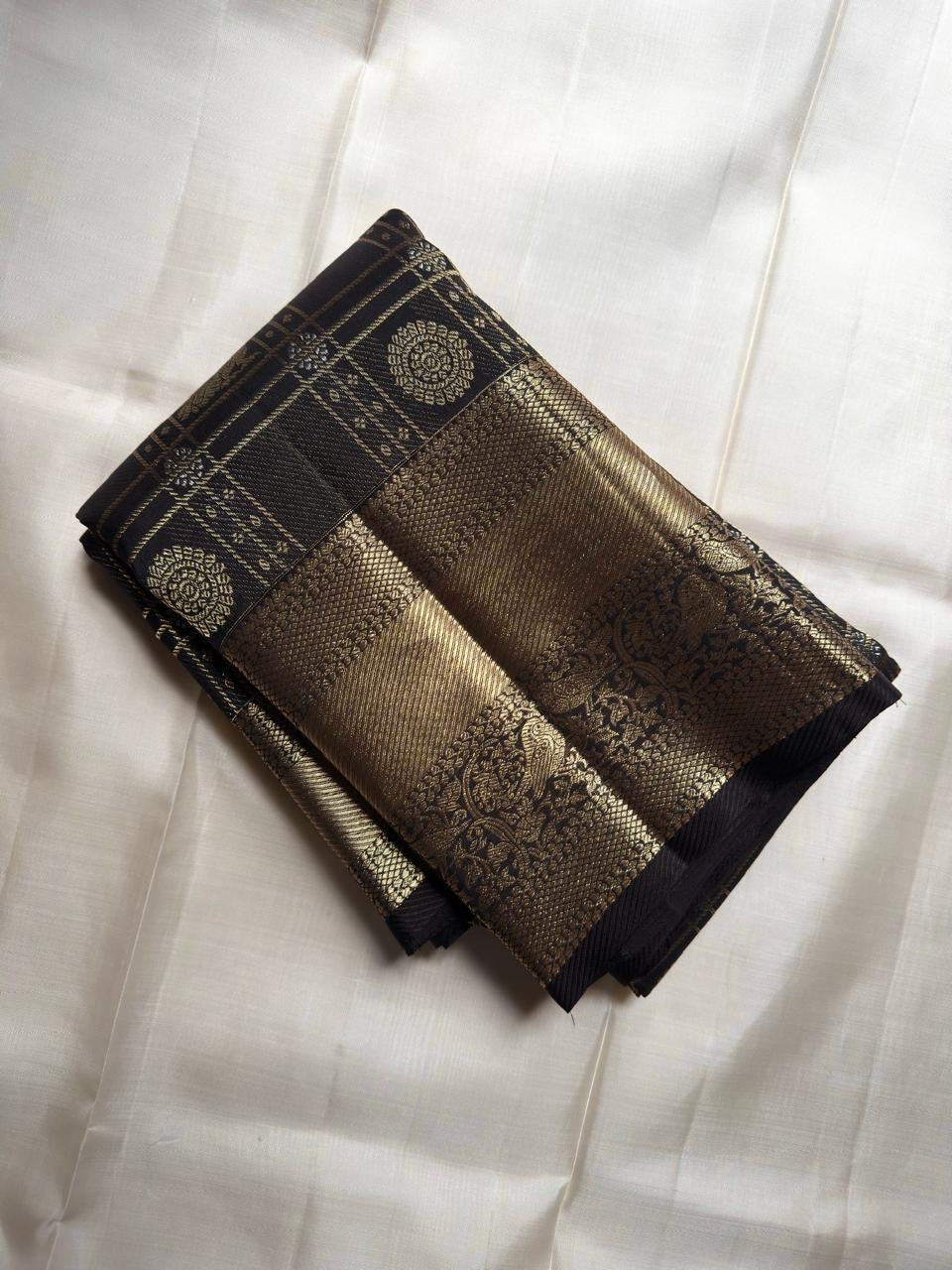 Raven Black Handwoven Pure Silk Kanjeevaram Saree with Zari Kattam and Antique Gold Peacock Border