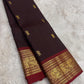 Deep maroon korvai border Kanchipattu saree – folded view