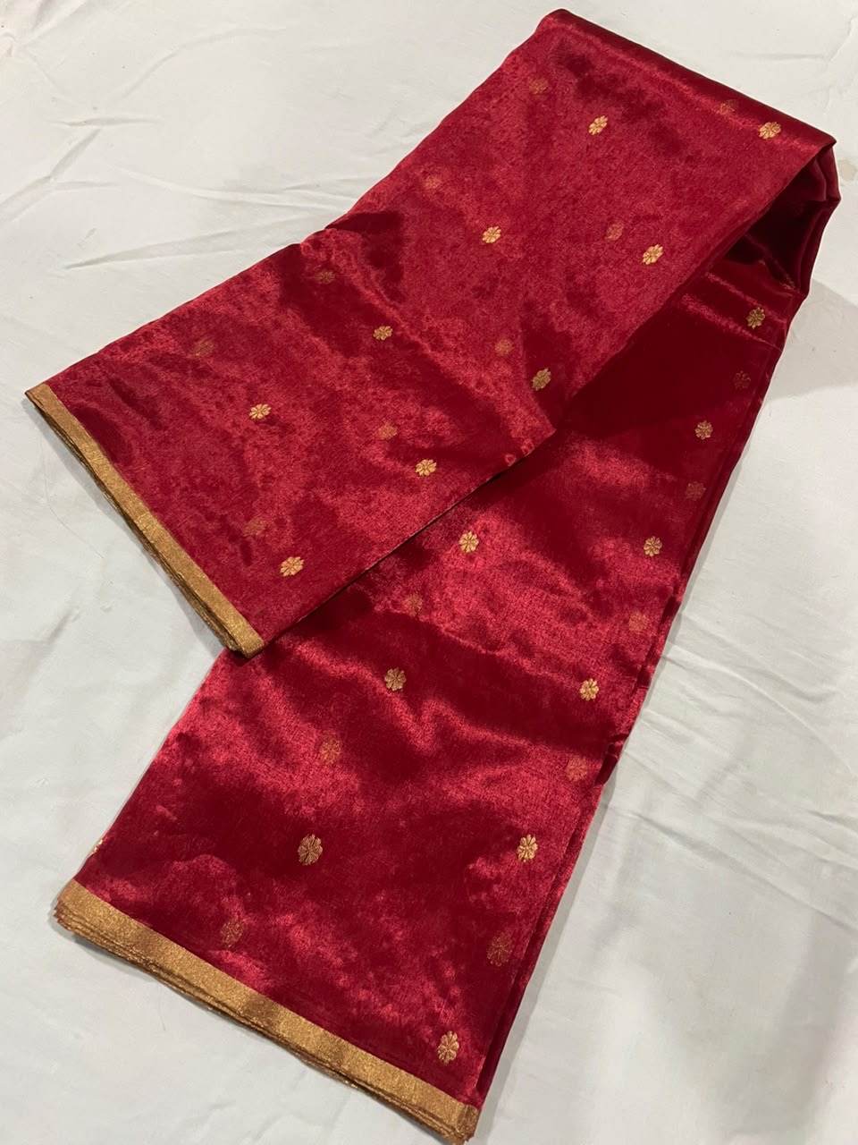 Crimson Red handloom Chanderi saree showing gold floral buttas scattered across the Jari Silk body
