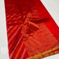 Close view of Vermilion Red Chanderi silk saree with wavy woven stripes and gold-toned edging