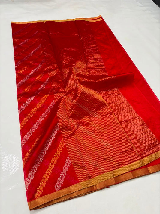 Close view of Vermilion Red Chanderi silk saree with wavy woven stripes and gold-toned edging